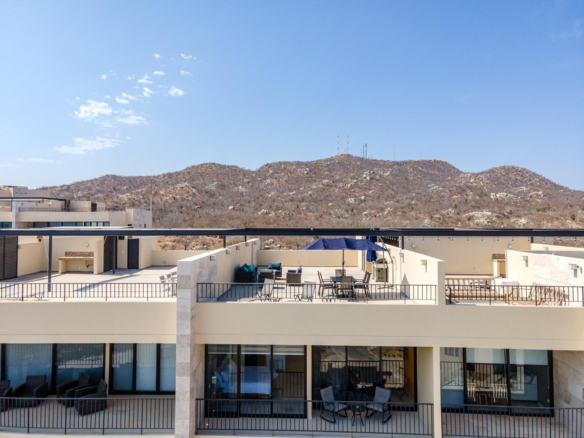 Los Cabos Solaria Welcome to Solaria Penthouse C-403, a stylish two-bedroom condo in El Tezal that offers both comfort and flexibility. Delivered turnkey, it's ready to enjoy or operate as a high-performing Airbnb. The private rooftop terrace features unobstructed – Solaria Turnkey Penthouse, Cabo Corridor, BS