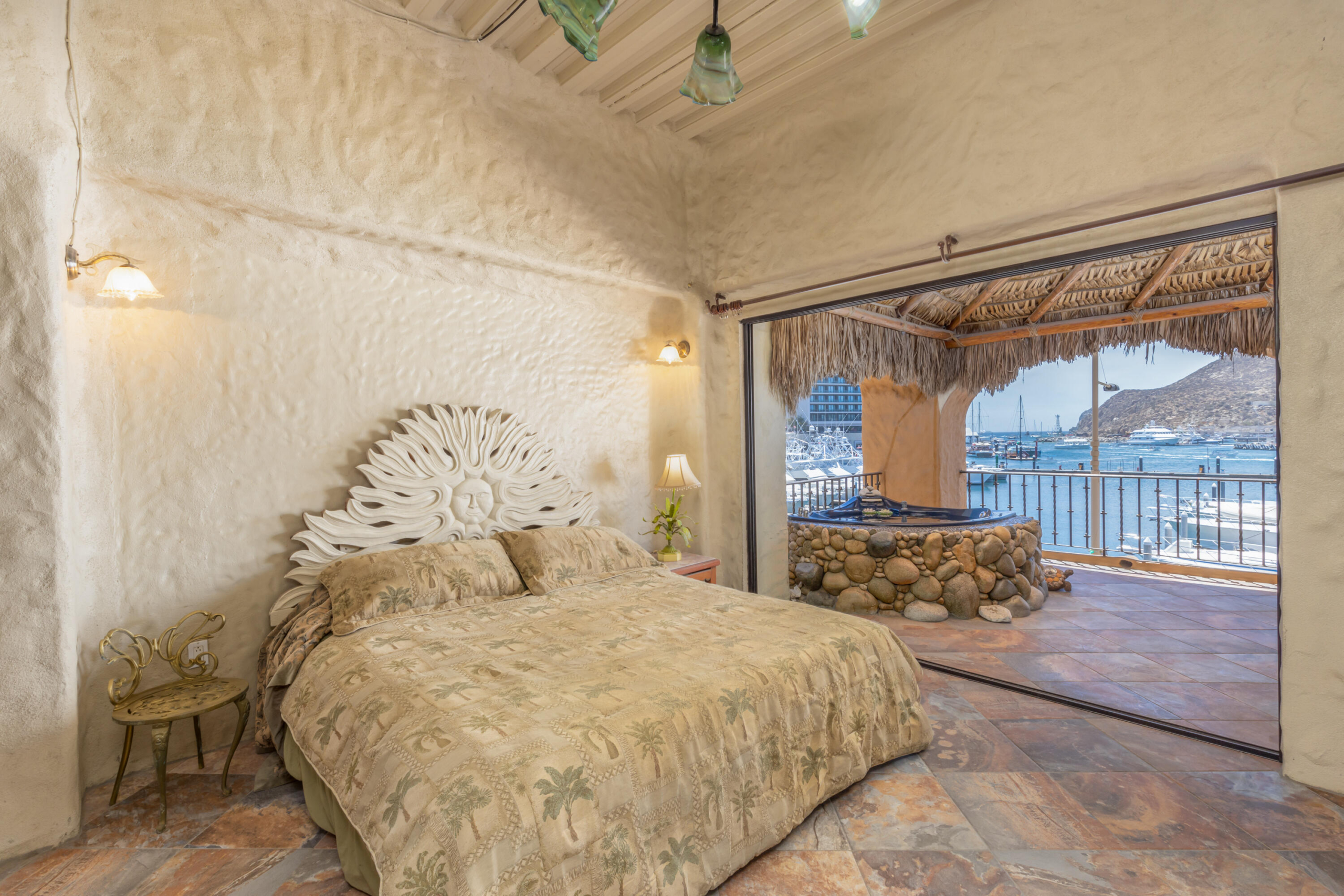 Esperanza Tesoro Not all luxury condos are created equal. This extraordinary end-unit residence at Tesoro Resort stands apart as one of the most unique offerings in Cabo San Lucas.Boasting approximately 1,800 square feet of bright, open living space, this two-bedroom, two-bath condominium features an oversized primary suite, dedicated laundry area, and a spacious floor plan designed to capture the energy and beauty of the marina from nearly every angle.The true showpiece is the spectacular palapa-covered terrace--one of the largest private outdoor living spaces in the marina. Complete with a custom Jacuzzi, this incredible outdoor retreat functions as a second living room, dining area, and entertainment space all in one. From sunrise to sunset, enjoy commanding for sale