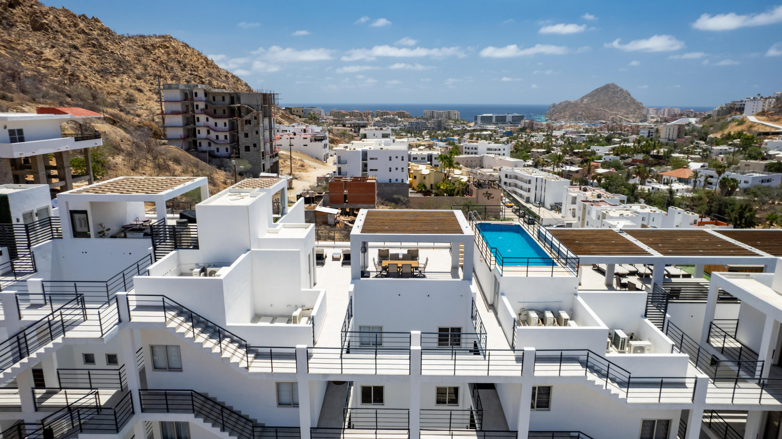 Esperanza Luxotica Iii Welcome to Sunset Corner Condo 201, a bright and inviting second-floor corner unit in the growing Sunset area of Cabo San Lucas. This 2-bedroom, 2-bathroom condo features an open-concept layout, high ceilings, abundant natural light, and pleasant city and mountain for sale