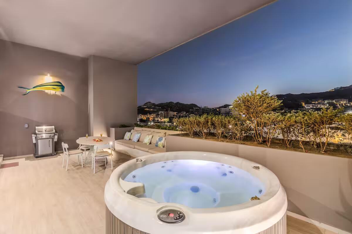 Esperanza The Paraiso Residences Experience the best location and the luxury with Condo Marina Vista, located at The Paraiso Residences, this modern 2BR/2BA condo is just steps from the world famous Cabo San Lucas Marina, putting you in the heart of the action. Delight yourself with the impressive private terrace, with jacuzzi, grill and much more. With its new and modern taste, Condo Marina Vista is your best option for your second home or investment in Cabo. This condo features modern decor in perfectly lit spaces, fully equipped kitchen with everything you will need, including electric stove, dishwasher, oven, microwave, etc. A spacious and fun living room perfect for entertaining and relaxing, with a comfortable sofa that can make extra sleeping space for one more guest. Two large bedrooms with King size beds and bathroom with shower, both with ample wardrobe space, TV and luxury bedding. The living room is spacious and perfect for entertaining, with a comfortable sofa that can function as an additional sleeping space for one or two more children.Wait until you come out! First open the pocket doors from the living room to the master bedroom to extend your area to the outside terrace with jacuzzi, barbecue and dining for six. Enjoy the huge spacious terrace and its magnificent for sale