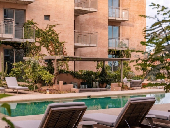 Esperanza Tramonti Paradiso One of the few move-in ready units available for immediate delivery, making this an exceptional opportunity for both homeowners and investors. Ideally located on the ground floor, this condominium offers convenient access and excellent potential for vacation rentals or long-term leasing.A standout feature of this condo is its private backyard garden, providing the perfect outdoor space for pets, children, entertaining, or simply relaxing in the privacy of your own green retreat.Bright and spacious, the condo features luxury finishes throughout and comes fully equipped with all appliances included. Owners enjoy access to the community's on-site amenities, along with the exclusive privilege of accessing the Pueblo Bonito Resorts, including a 20% discount at 29 restaurants and the Spa – Tower F Salomon de la Cruz, Cabo Corridor, BS