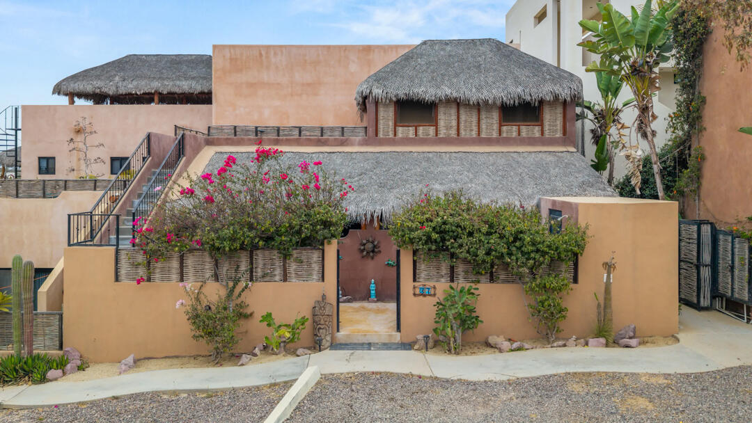 Esperanza Villas De Cerritos Beach Discover a unique opportunity in the sought-after community of Villas de Cerritos Beach. Three Charming Casitas features three independent living spaces, including two identical ground-floor studios with private kitchens and covered outdoor terraces, plus a charming upper-level loft-style casita with its own kitchenette and spacious terrace. Designed with authentic Baja character, the property showcases traditional palapa roofing, handcrafted details, warm natural finishes, and inviting indoor-outdoor living spaces. Each unit offers privacy, comfort, and functionality, creating an ideal setup for vacation rentals, long-term tenants, or a combination of personal use and income generation.The two lower studios feature comfortable sleeping quarters, full bathrooms, kitchenettes, and shaded outdoor patios perfect for enjoying the relaxed Cerritos lifestyle. The upper loft-style casita offers an elevated sense of privacy, with an open-concept layout, palapa ceilings, and a generous terrace area.Located just minutes from Cerritos Beach, one of Baja Sur's premier surf and swimming destinations, the property enjoys access to the community's resort-style amenities, including a swimming pool, jacuzzi, and beautifully maintained common areas. Restaurants, cafés, and local attractions are all within easy reach.Whether you are seeking a turnkey vacation rental property, a flexible multi-unit investment, or a personal Baja retreat with exceptional income potential, Casa Tres Casitas presents a rare opportunity in one of the region's most desirable beach communities. for sale