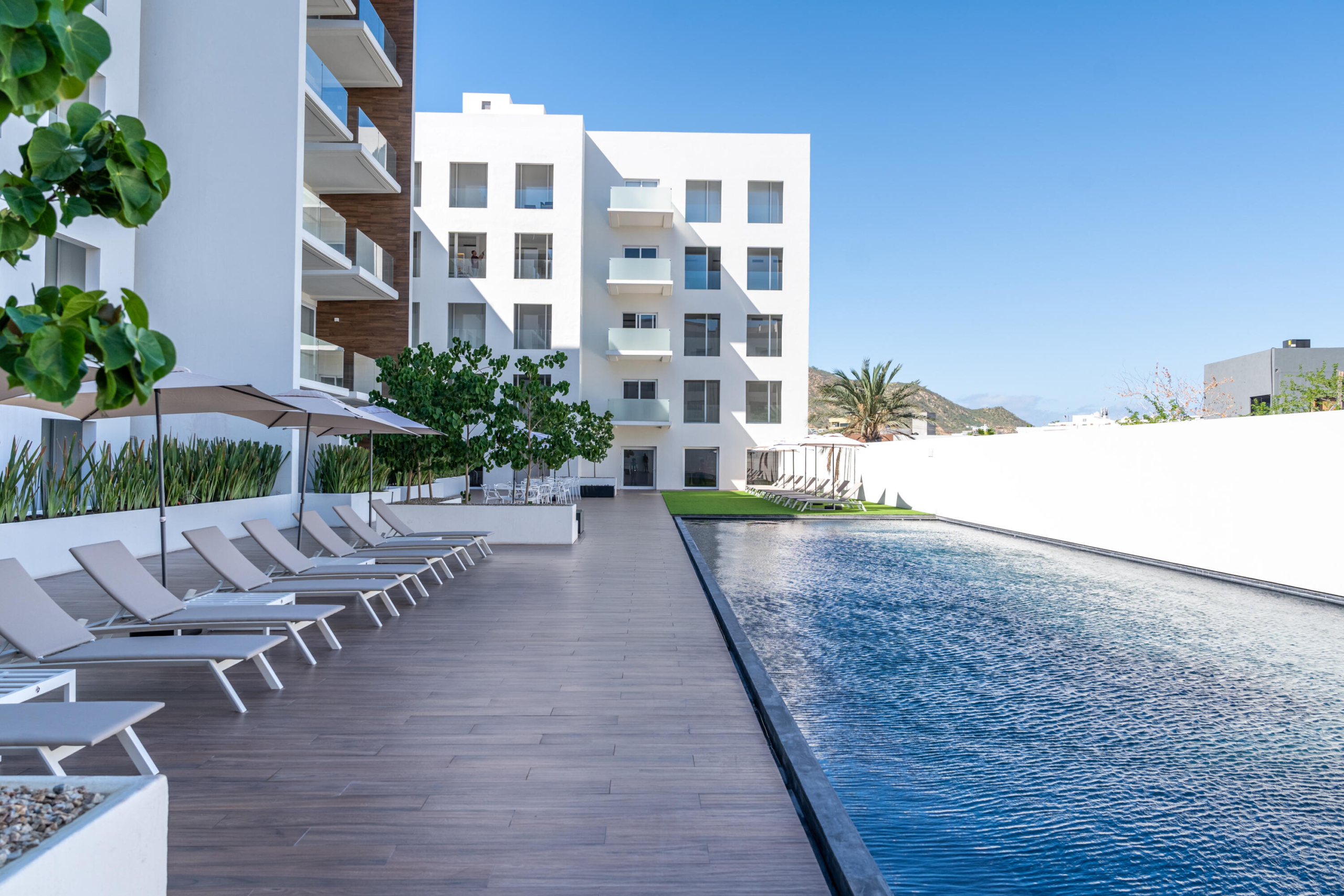 Esperanza Marea Los Cabos Pelicano 402 is a turnkey 2-bedroom, 2-bathroom residence, fully furnished and move-in ready. Its open-concept layout seamlessly connects the living, dining, and kitchen areas to a spacious continuous terrace, also accessible from both bedrooms, creating effortless indoor-outdoor living. Designed to maximize privacy, natural light, and functionality, this home offers a peaceful and inviting atmosphere. Ideal as a full-time residence, vacation home, or investment property, it combines quality craftsmanship, contemporary finishes, and the added confidence of buying directly from the developer. for sale