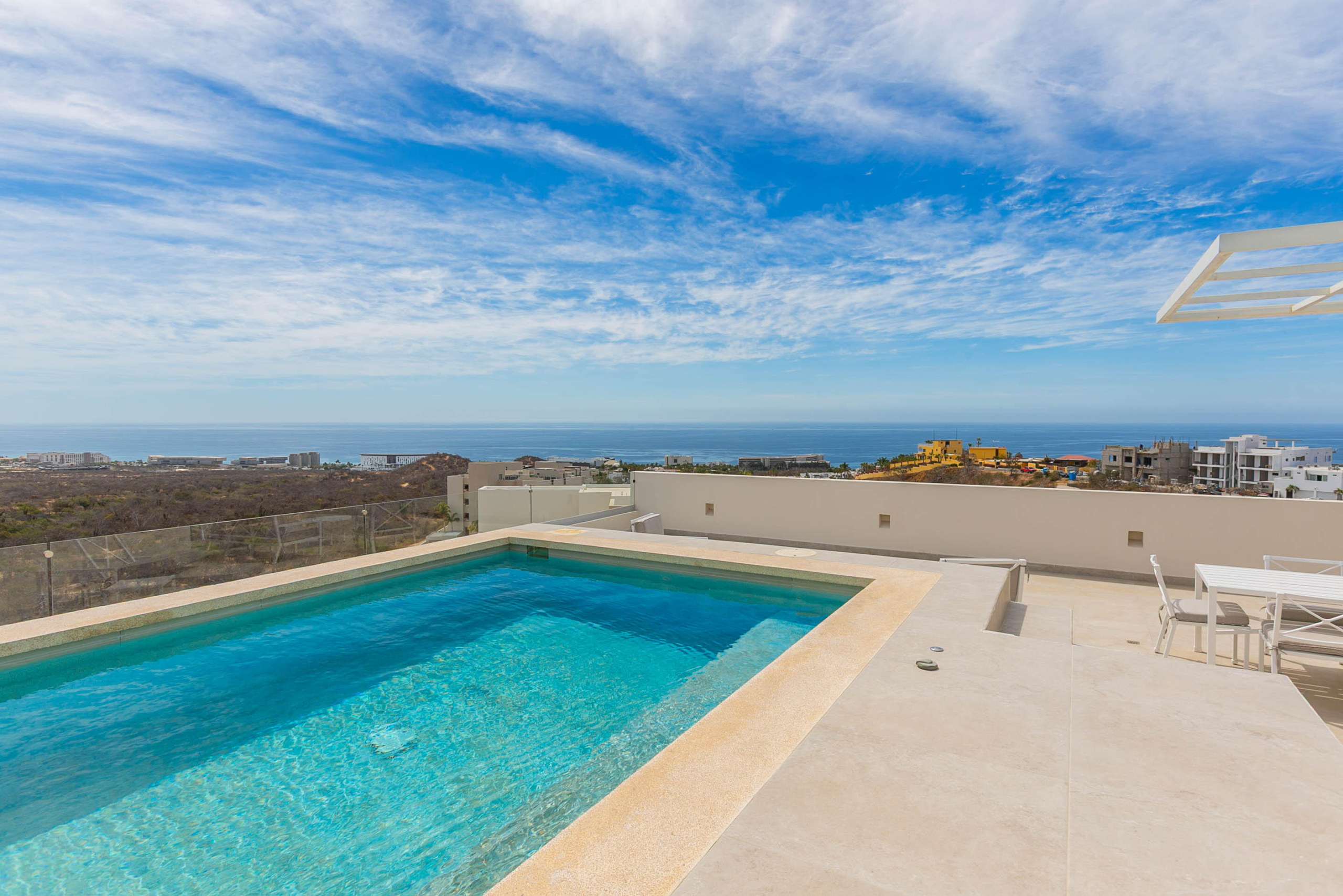 Esperanza El Tule-Inland:General Located in one of El Tule's most relaxing communities, Vistamar Penthouse 2502 is a turnkey design masterpiece. This stunning residence features approximately 1,506 square feet of interior living space complemented by an exceptional 1,184 square feet of rooftop area, creating an expansive and airy atmosphere with breathtaking ocean and desert for sale